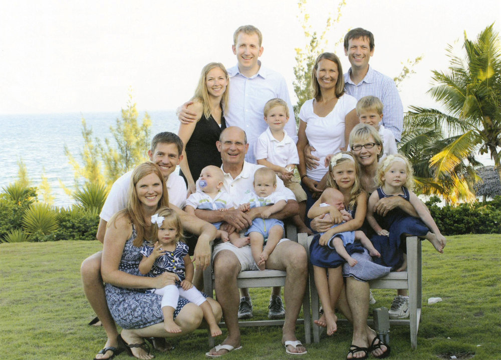 <b>THE WILSON FAMILY:</b> President Ted N.C. Wilson, center, posing with his wife, Nancy, right, and their children and grandchildren in a 2013 Christmas photo. Edward is without the pacifier in Ted Wilson's arms, while James is being held by the granddaughter on Nancy Wilson's lap. Photo courtesy of the Wilson family